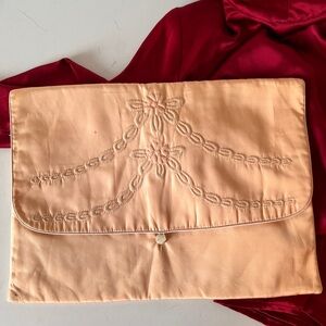 Vintage 1940’s baby pink satin-like hosiery lingerie bag